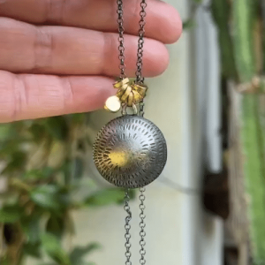 Dome 22 karat gold and silver necklace