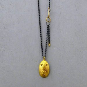 Handmade 22 karat gold Face pendant