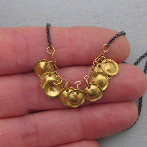 22 Karat Gold and Silver charms necklace