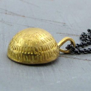 Dome 22k gold pendant on silver chain