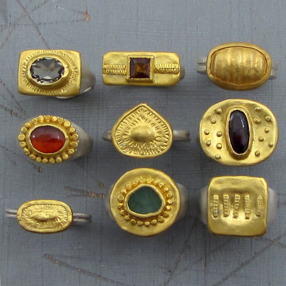 Gold rings with gemstones