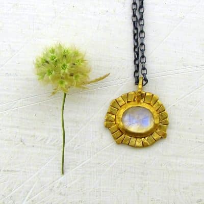 Osnat Zilbershtein - gold 'sun' pendant