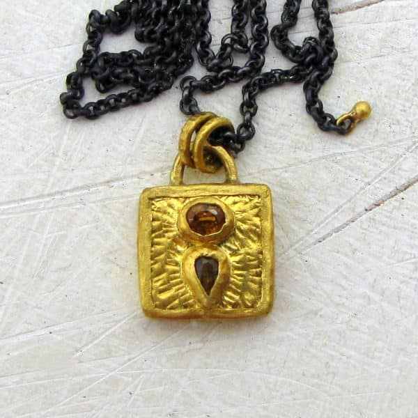 24k gold Sapphire pendant on silver necklace