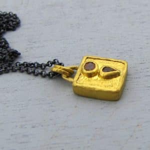 24k gold Sapphire pendant on silver necklace