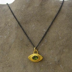 Peridot Evil Eye 24 karat gold pendant necklace