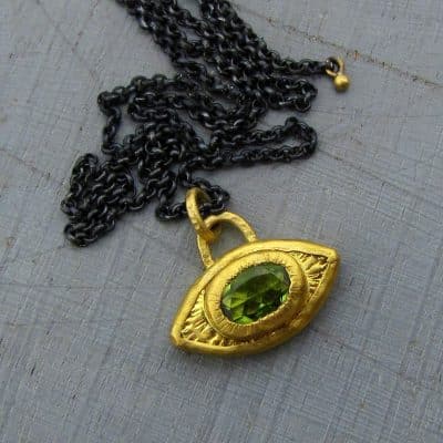 Peridot Evil Eye 24 karat gold pendant necklace