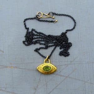 Peridot Evil Eye 24 karat gold pendant necklace