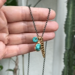 Turquoise 24k gold pendant on a silver chain