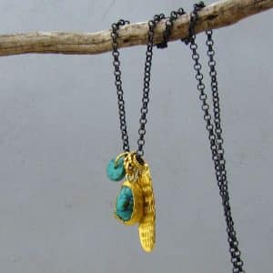 Turquoise 24k gold pendant on a silver chain