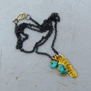 Turquoise 24k gold pendant on a silver chain