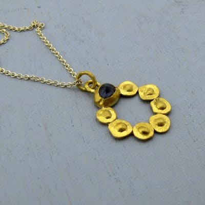 24k gold Blue Spinel pendant on silver necklace