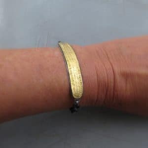 Textured 22k gold bar and silver bracelet