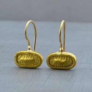 Oval handmade pure gold earrings